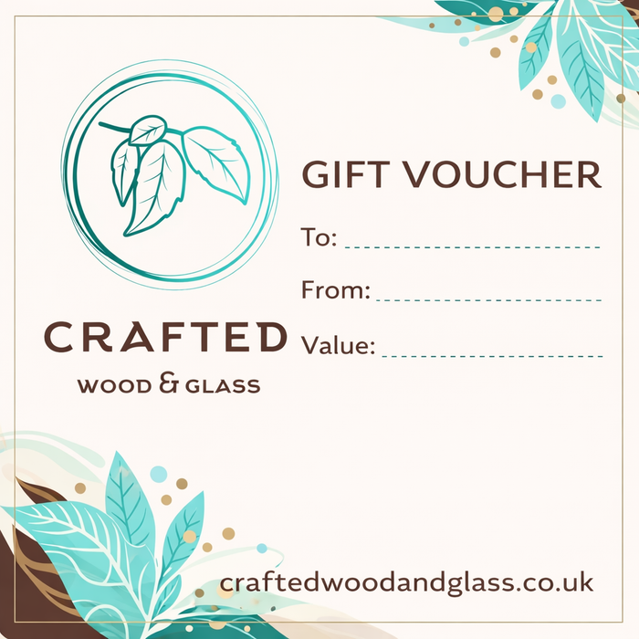 A square gift voucher design for Crafted Wood & Glass, featuring a teal circular leaf logo, the text 'GIFT VOUCHER', 'To:', 'From:', and 'Value:', with 'craftedwoodandglass.co.