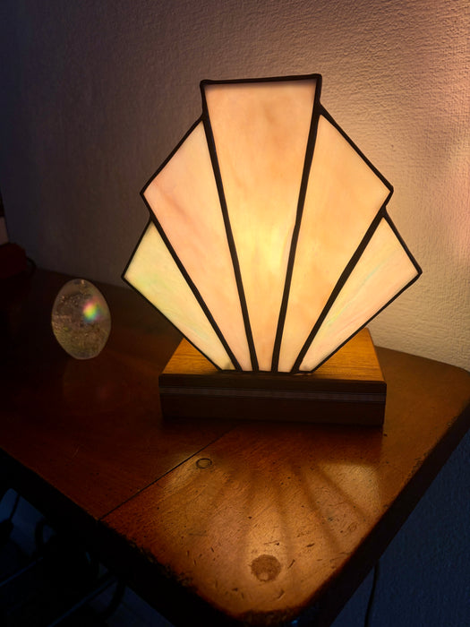 Art Deco inspired box fan table lamp on a mahogany stand in pale pearlescent pinks, greens and cream
