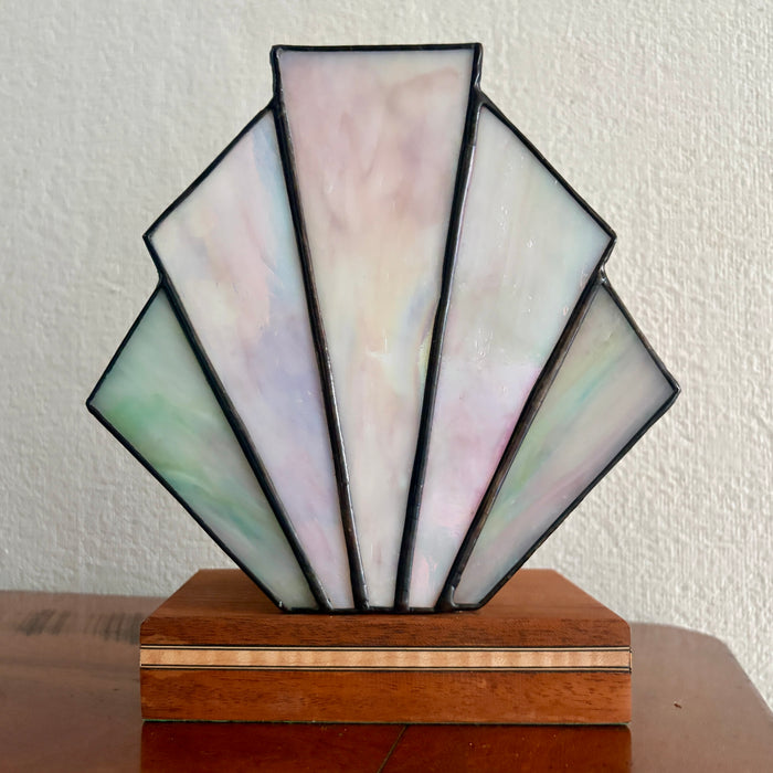 Art Deco inspired box fan table lamp on a mahogany stand in pale pearlescent pinks, greens and cream