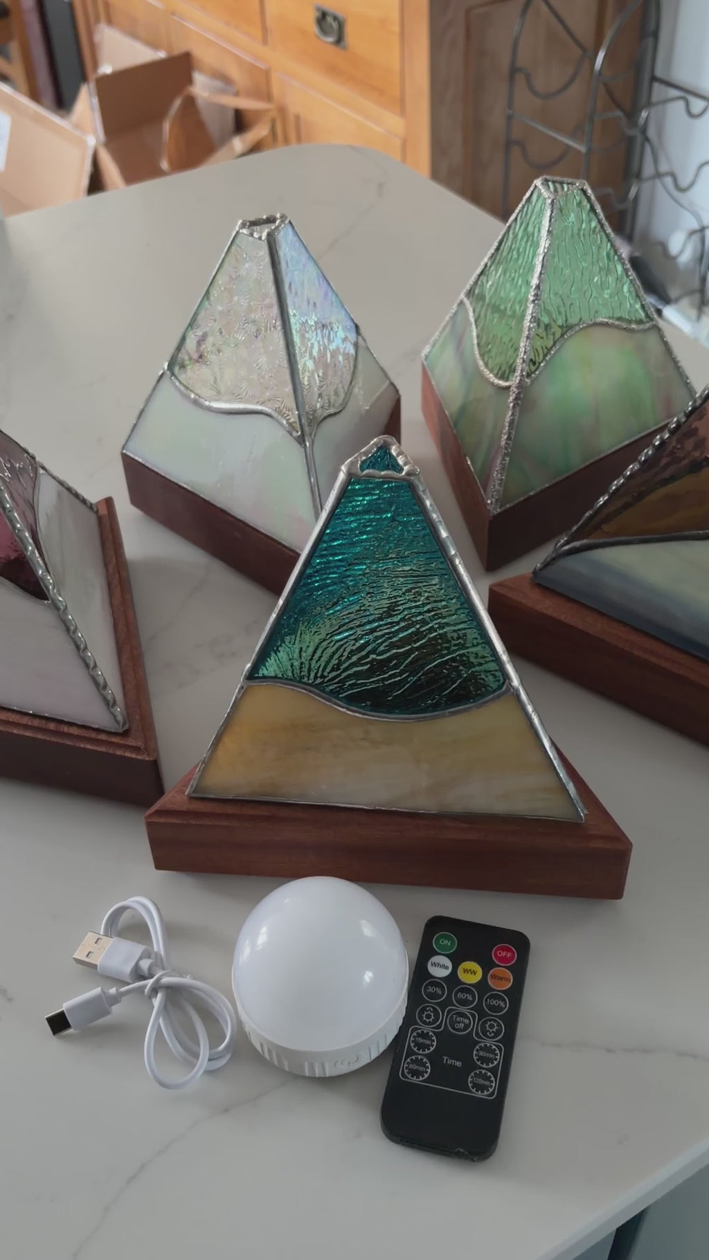video showing a range of pyramid tiffany style rechargeable battery operated lamps with instructions